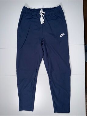 Nike Blue Track Pants with White Swoosh